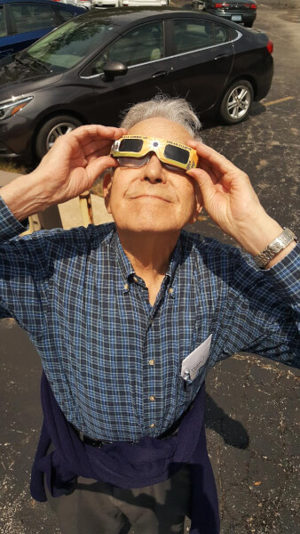 Norman Besheer looking at an eclipse.